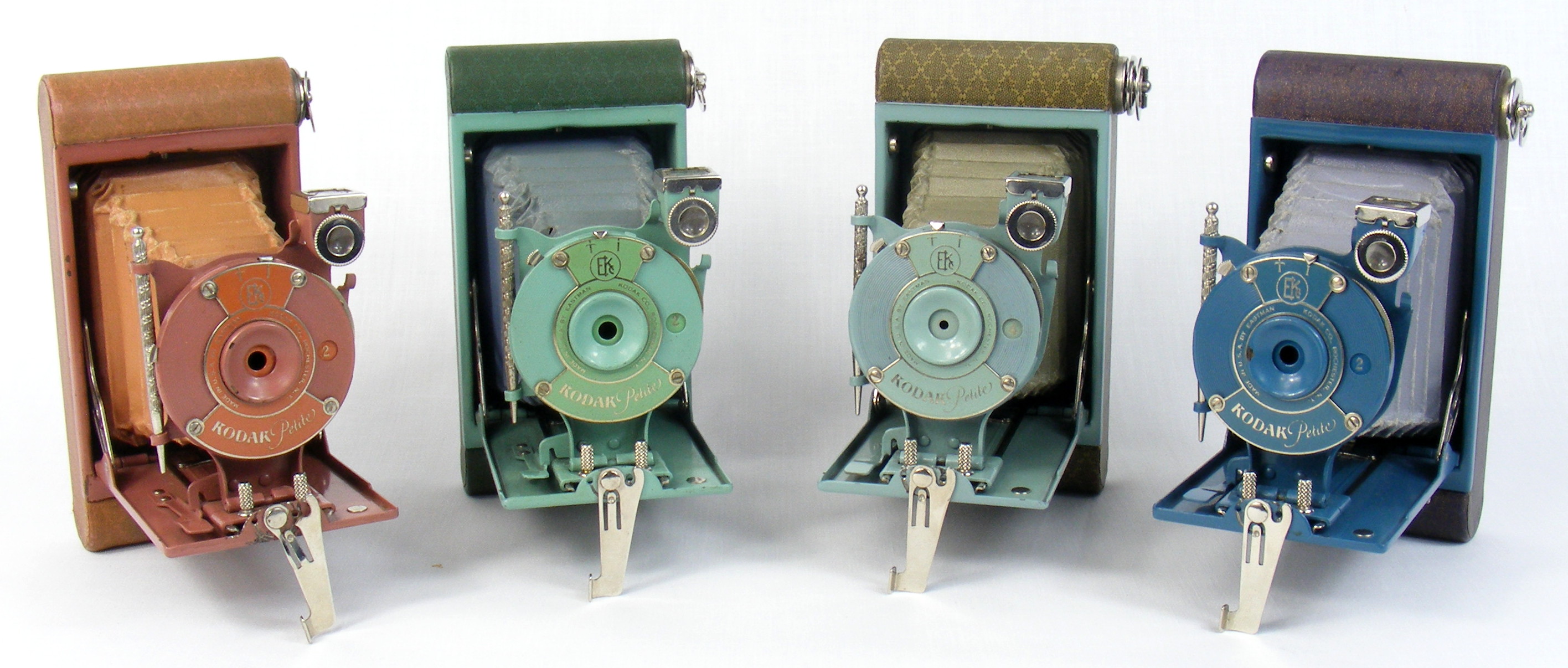 Image of collection of Kodak Petite folding cameras